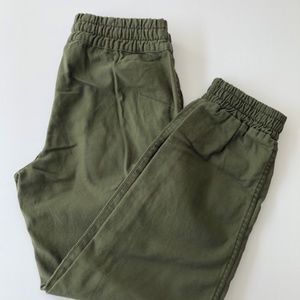 TNA - olive green pants with elastic waist and cuffs size S